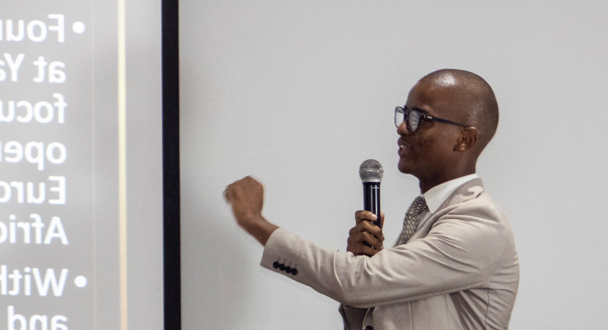 Sethu Ndlovu, Founder of Yander Acquisition, presenting at a B2B marketing event